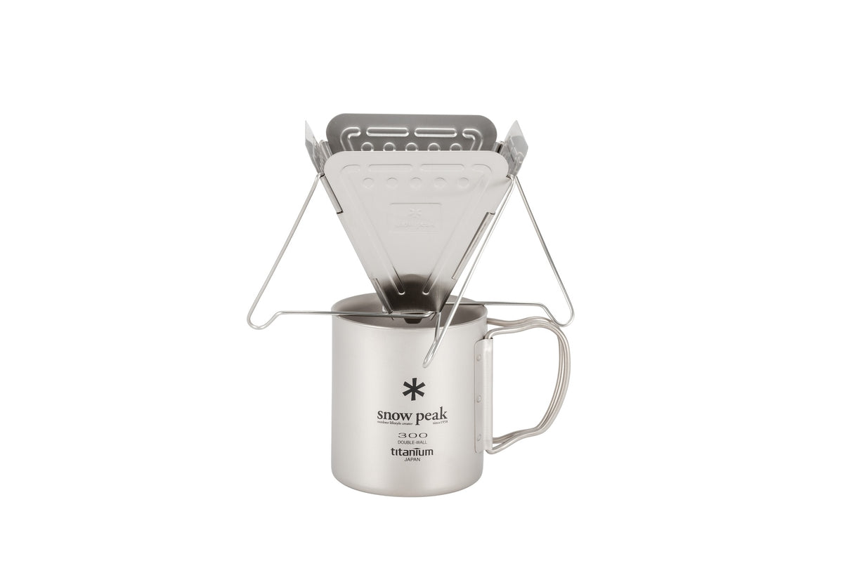 Snow Peak Collapsible Coffee Drip for camp pour over coffee on a neutral background.