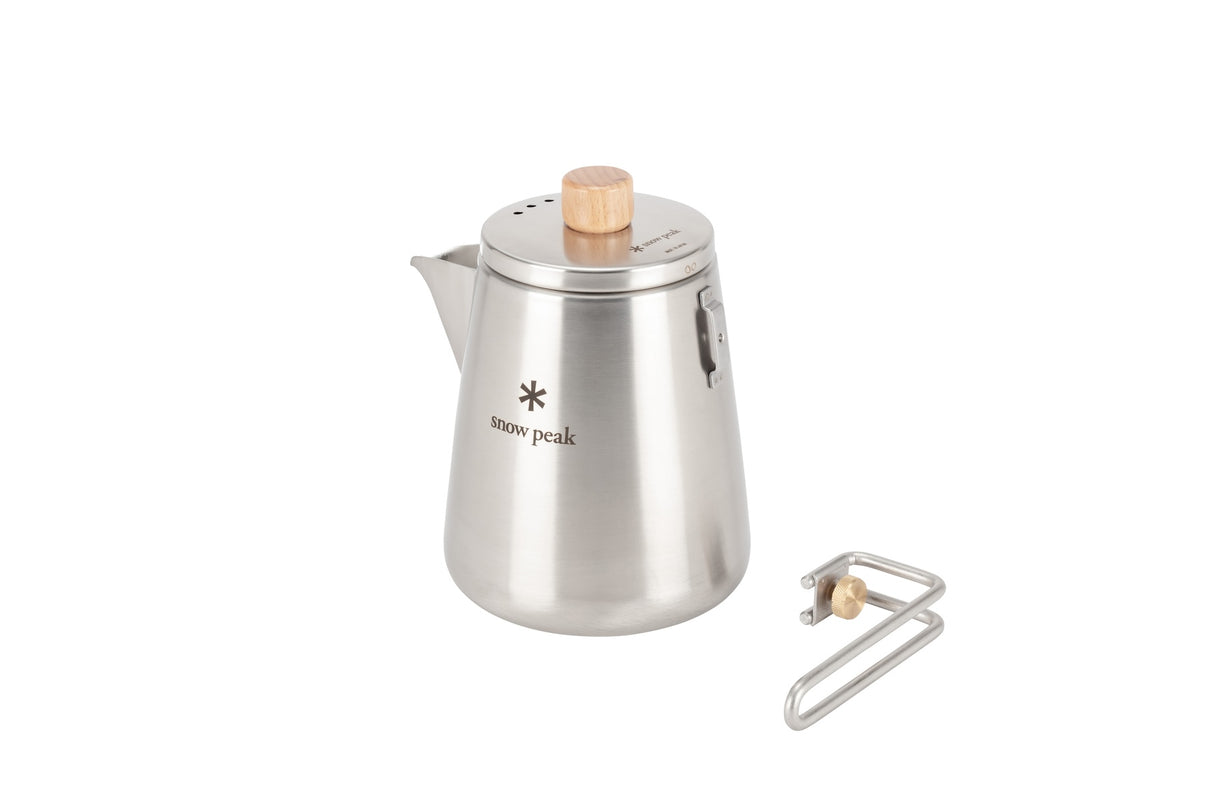 Snow Peak Field Barista Kettle for camp coffee on a neutral background.