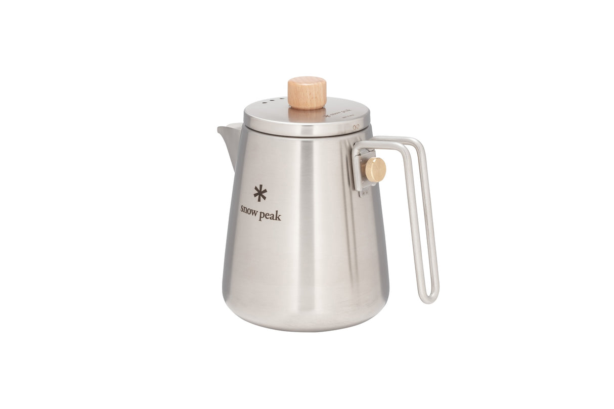 Snow Peak Field Barista Kettle for camp coffee on a neutral background.