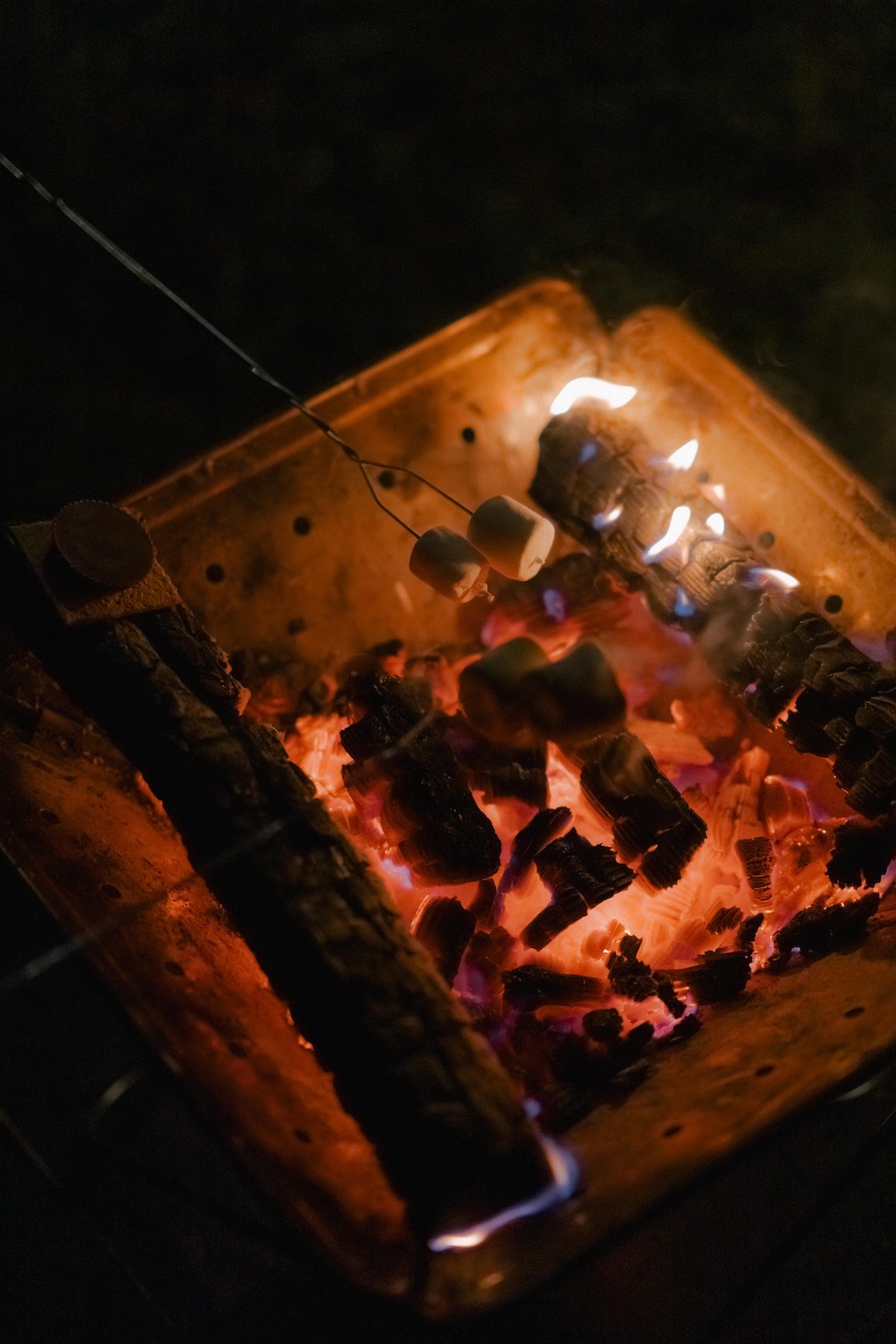 Takibi Fire & Grill Set camping fireplace being used outdoors.