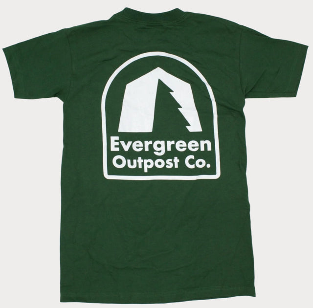 Evergreen Outpost Co. Unisex Heavyweight Logo Tee from the rear on a neutral background.