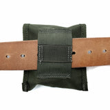 Black tactical pouch attached to a brown belt on a white background