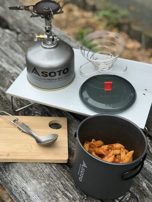 SOTO Outdoors Field Hopper table makes for a perfect mini camp table to keep cookware off the ground.