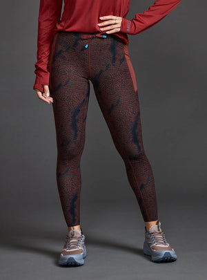 Janji's Women's 7/8 Trail Tight in Shadowlands worn by a woman from the front on a neutral background.