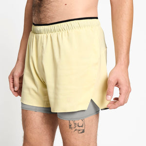 Ciele Athletics M DLYShort 5" Long Brief Short men's running shorts in Glade worn by a man on a neutral background.