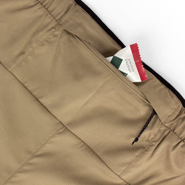 Close-up of Ciele Athletics Men's DLYShort 5" 2-in-1 Running Short in Canvas Beige pocket.