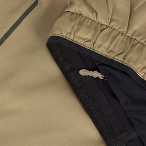 Close-up of Ciele Athletics Men's DLYShort 5" 2-in-1 Running Short in Canvas Beige hidden key pocket