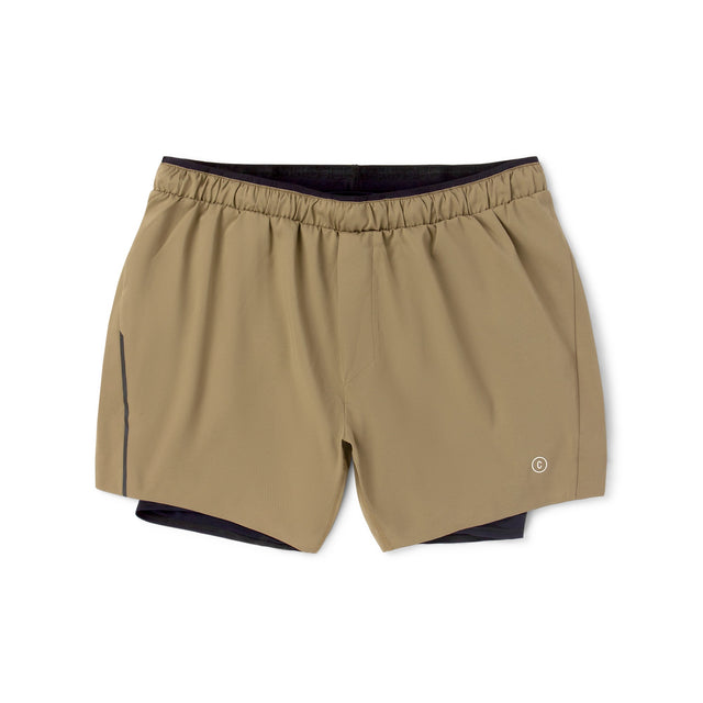 Ciele Athletics Men's DLYShort 5" 2-in-1 Running Short in Canvas Beige with black accents on a white background