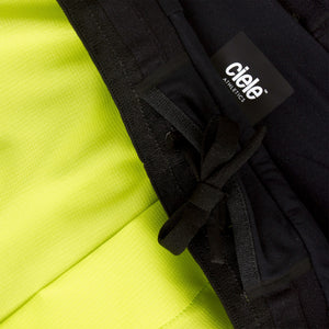 Close-up of a Ciele Athletics Men's DLYShort 5" 2-in-1 Running Short in Lime Green