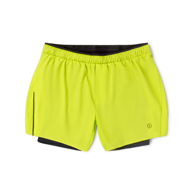Ciele Athletics Men's DLYShort 5" 2-in-1 Running Short in Lime Green with black accents on a white background