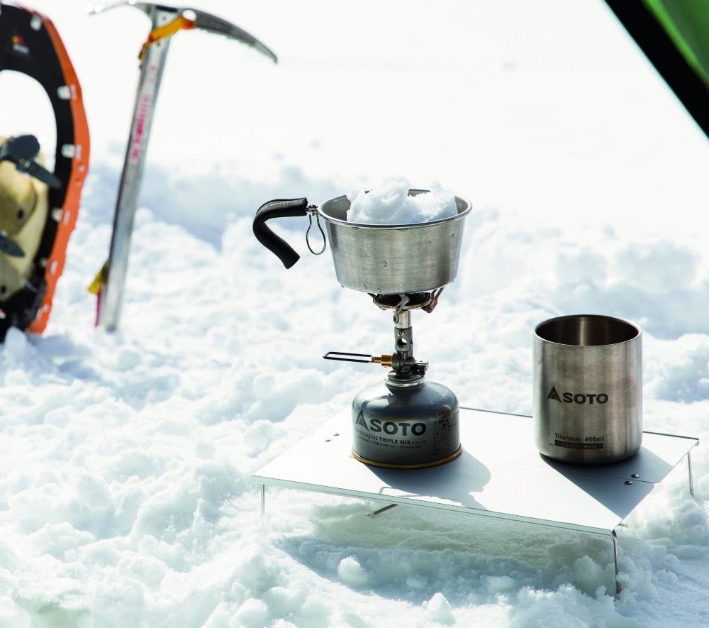 SOTO Outdoors Field Hopper table makes for a perfect mini camp table to keep cookware off the ground.