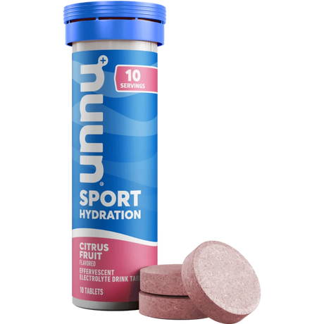 Nuun Sport in Citrus Fruit on a neutral background.