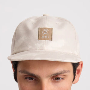 Roark Bless Up Trail Hat Strapback Hat in Fossil with a brand logo on a white background