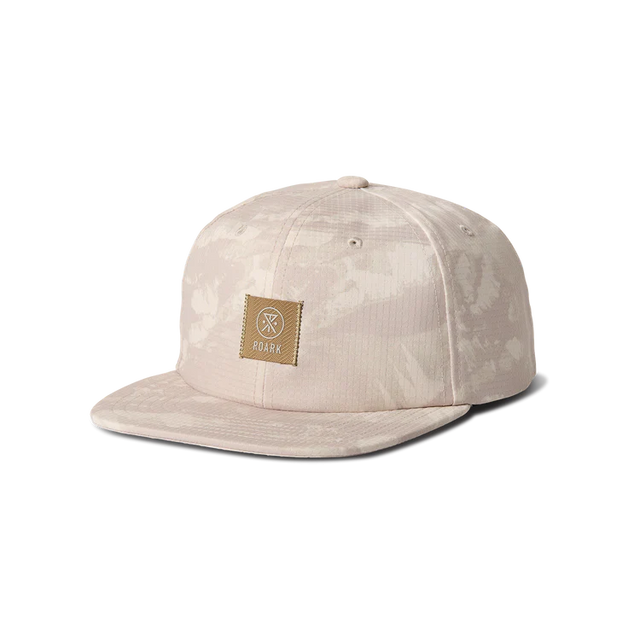 Roark Bless Up Trail Hat Strapback Hat in Fossil with a logo patch on a white background