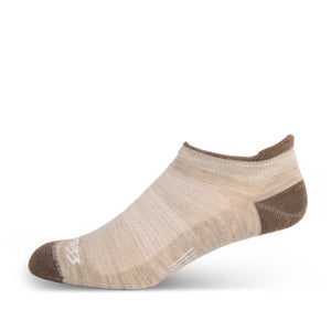 Minus33 Micro Liner No Show Tab Merino Wool Socks in Oatmeal on a neutral background.