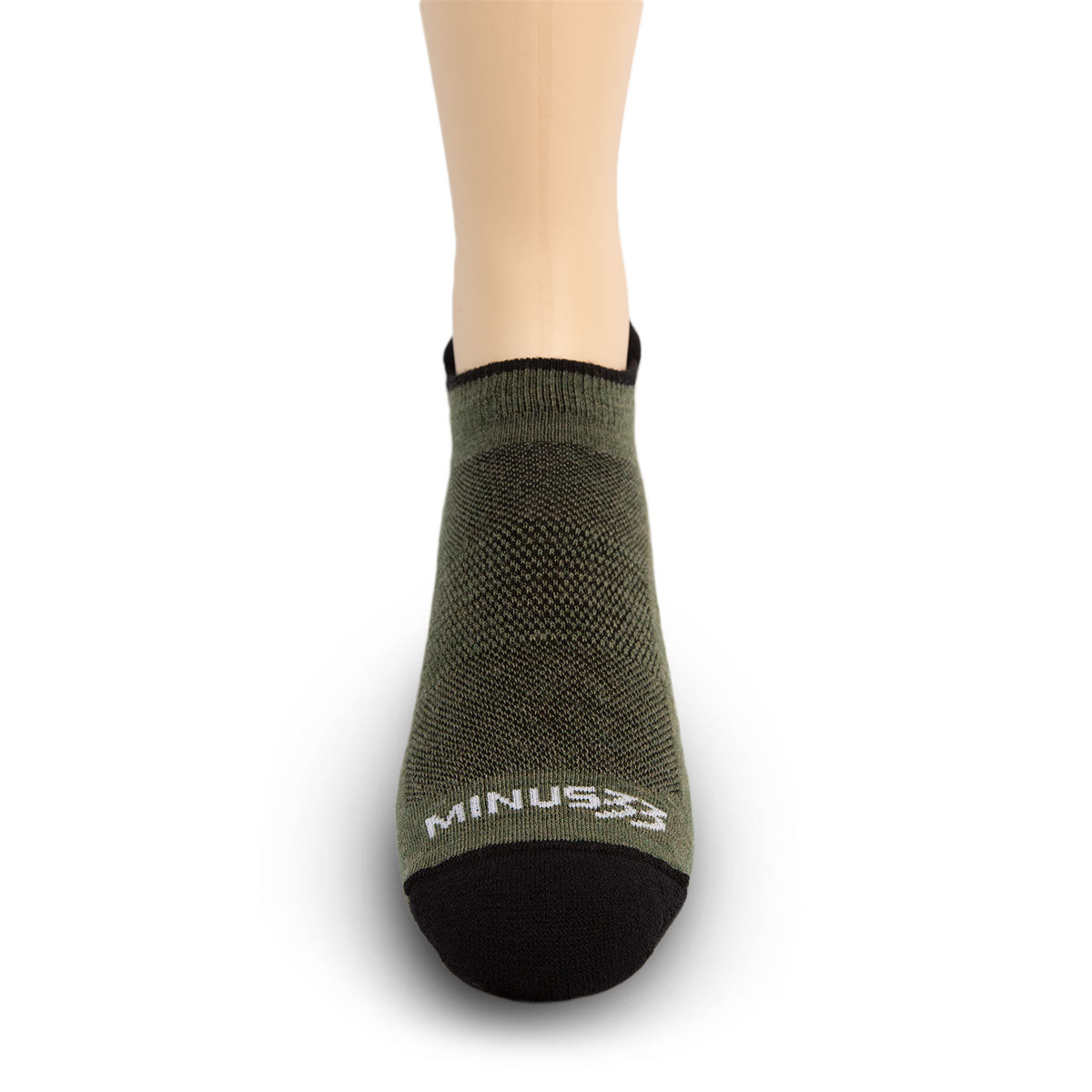 Minus33 Micro Liner No Show Tab Merino Wool Socks in Olive Drab on a neutral background.