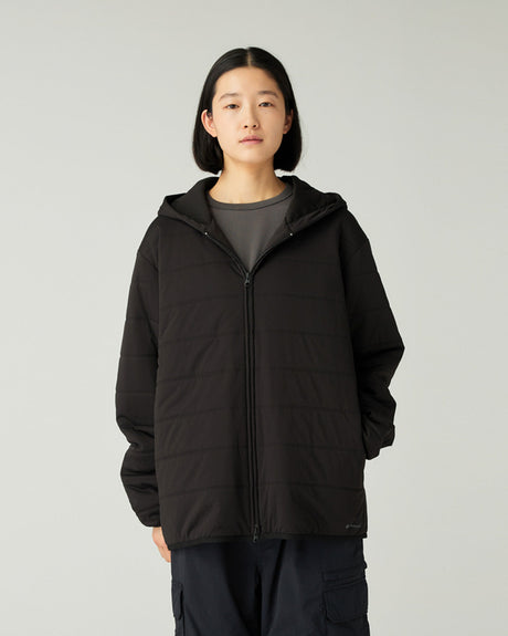 Person wearing a Snow Peak Flexible Insulated Zip Up Hoodie in Black on a plain background