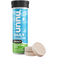 Nuun Energy in Ginger Lime Zing on a neutral background.