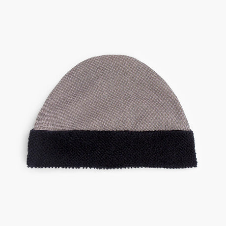 ciele UHBeanie fleece running beanie in Peachskin with black band on a white background