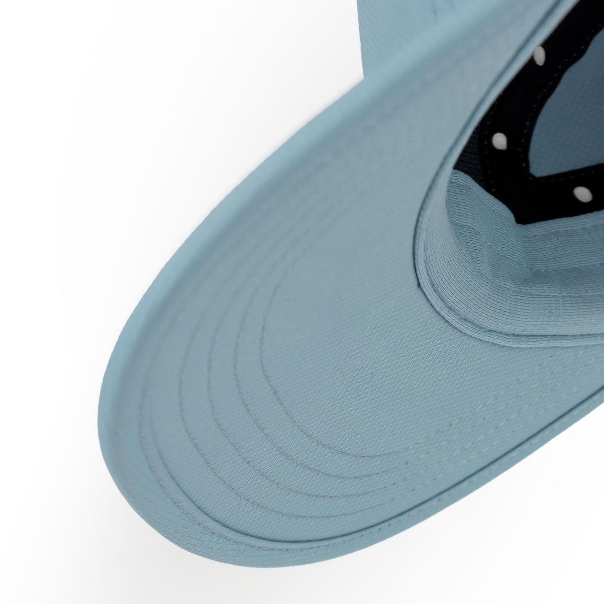 Close-up of a Ciele Athletics GOCap Classic - Athletics Chambray blue running cap on a white background