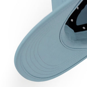 Close-up of a Ciele Athletics GOCap Classic - Athletics Chambray blue running cap on a white background