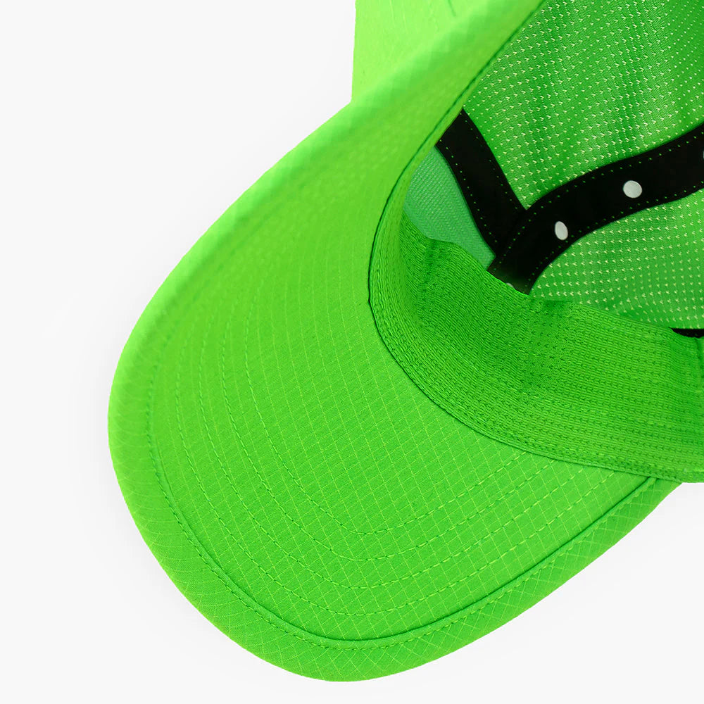 Close-up of a ciele athletics GOCap SC Field - Capital RC running hat in Acid Green on a white background