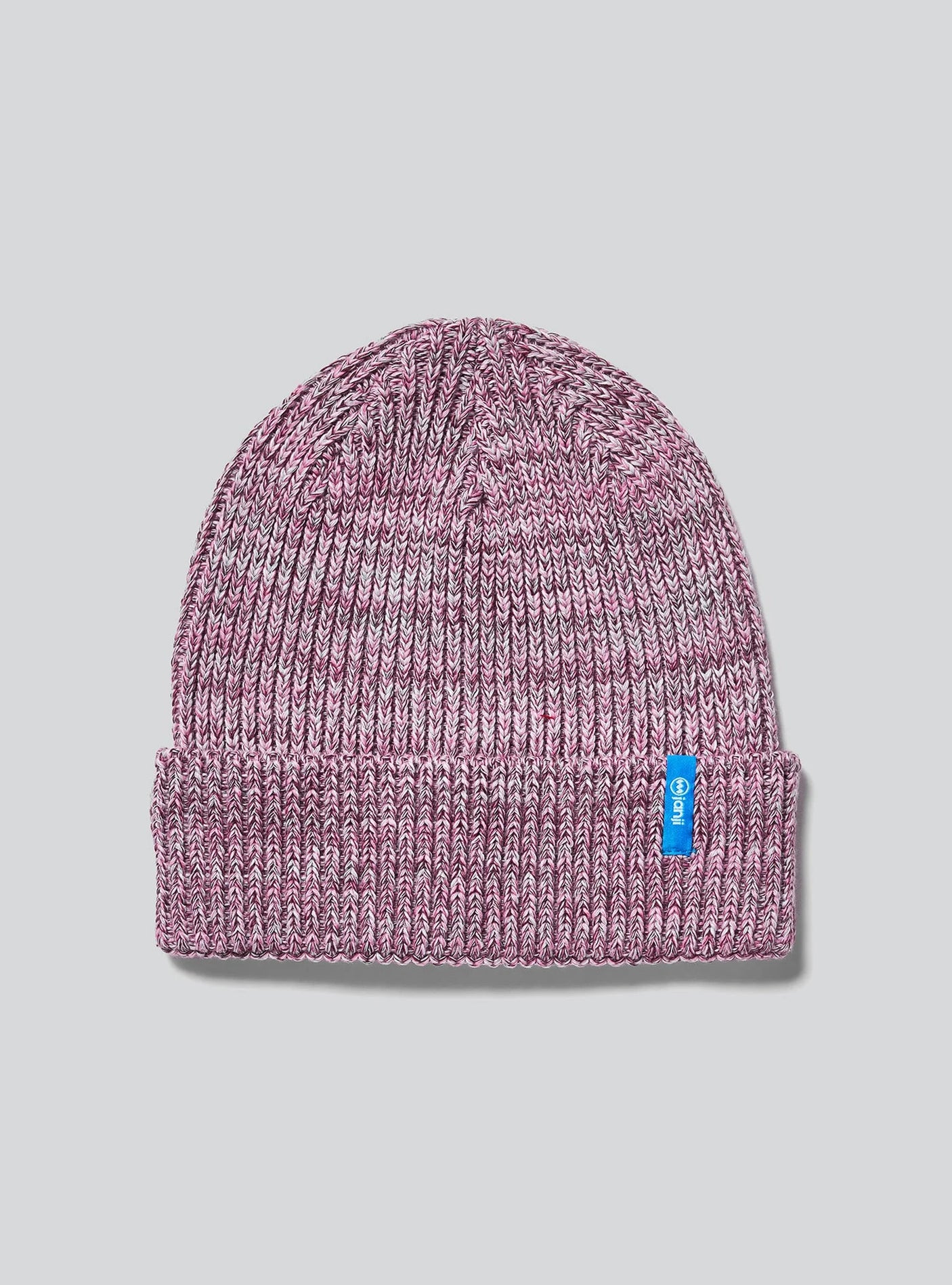 Janji Threshold Melange Beanie in Wild Shrub on a neutral background.