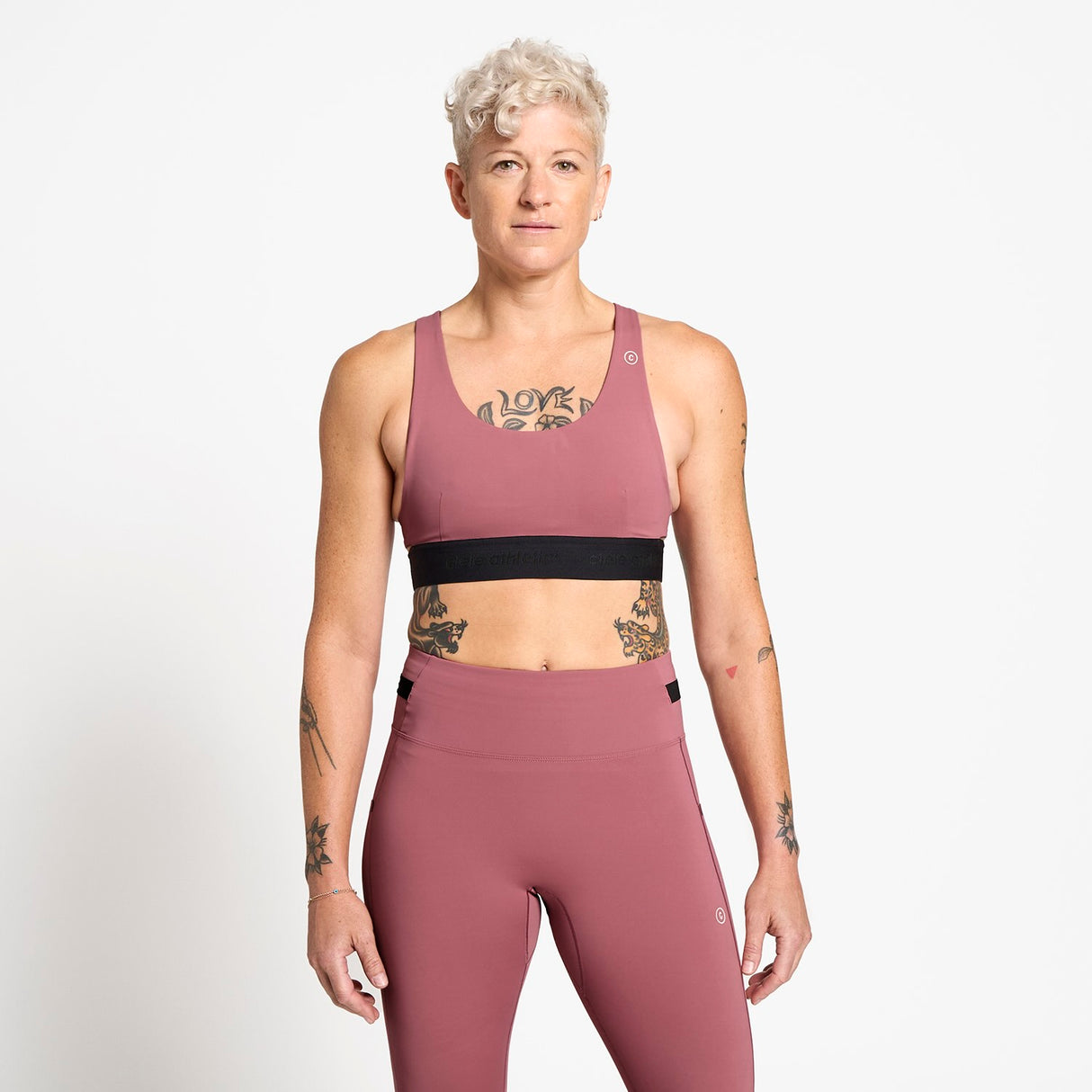 Ciele Athletics W QCKBra women's running bra in Deco Rose worn by a woman on a neutral background.