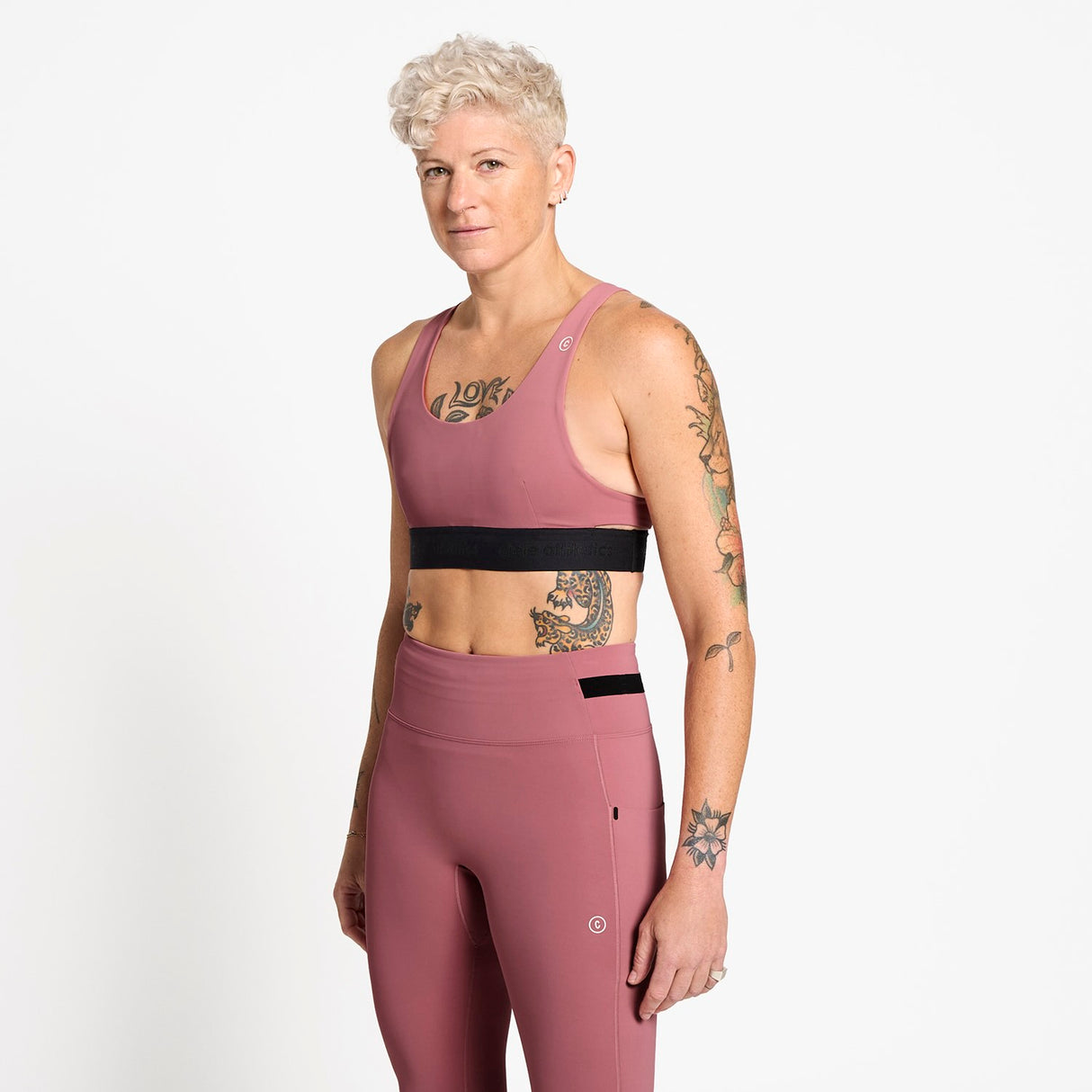 Ciele Athletics W QCKBra women's running bra in Deco Rose worn by a woman on a neutral background.
