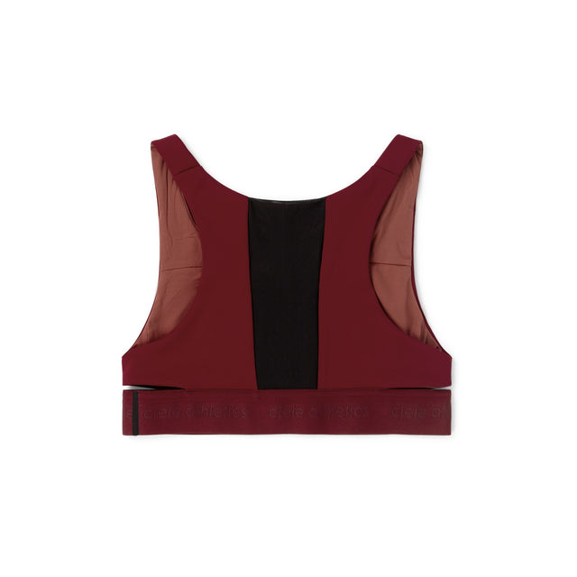 Ciele Athletics Women's QCKBra Sports Bra in Crimson Red Maroon sports bra with a black rear vent on a white background