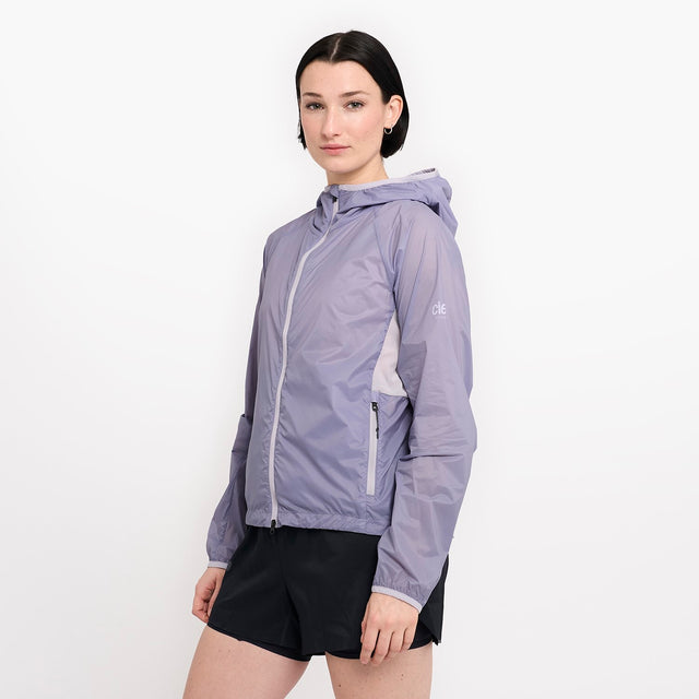 Ciele Athletics W VNTJacket women's running jacket in Light Grape worn by a woman on a neutral background.