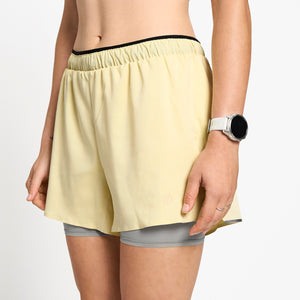 Ciele Athletics W DLYShort 4" Long Brief women's running shorts in Glade worn by a woman on a neutral background.