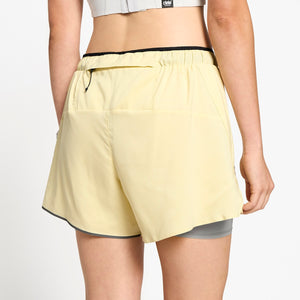 Ciele Athletics W DLYShort 4" Long Brief women's running shorts in Glade worn by a woman on a neutral background.