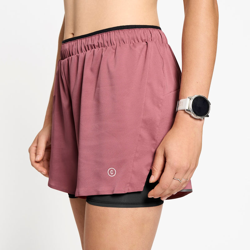 Ciele Athletics W DLYShort 4" Long Brief women's running shorts in Deco Rose worn by a woman on a neutral background.