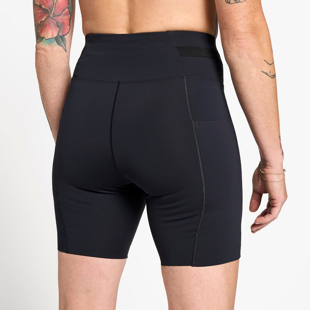 Ciele Athletics W FSTTight Short 7" women's running tights in Shadowcast worn by a woman on a neutral background.