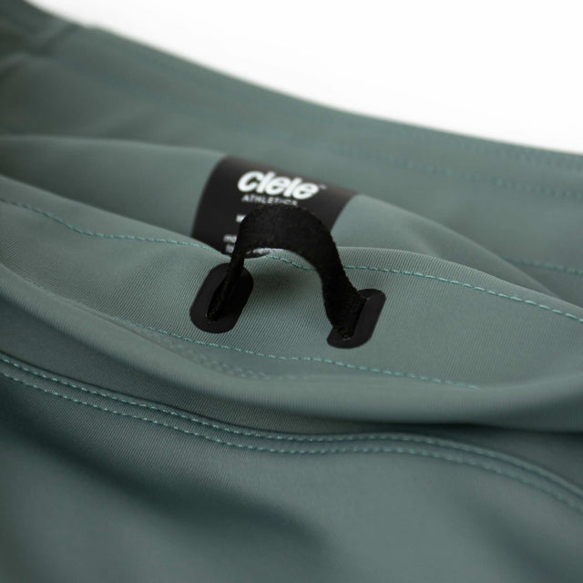 Ciele Athletics W FSTTight Short 7" women's running tights in Silver Pine on a neutral background.