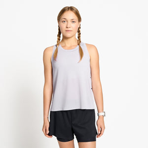 Ciele Athletics W FSTSinglet women's running tank top in Misty Lilac worn by a woman runner on a neutral background.
