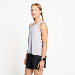 Ciele Athletics W FSTSinglet women's running tank top in Misty Lilac worn by a woman runner on a neutral background.