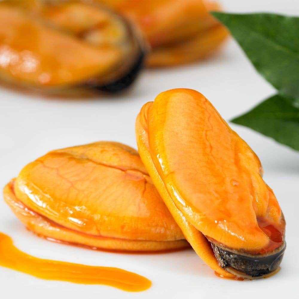 La Narval from Don Gastronom Galician Mussels in Spanish Escabeche Sauce on a neutral background.