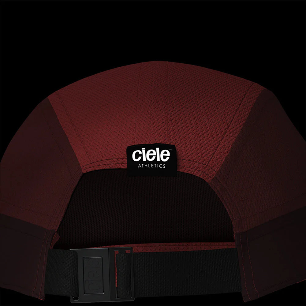 Ciele Athletics ALZCap - Horizon in Akutan from the rear on a dark background to show the reflective detailing.