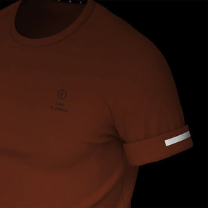 Ciele Athletics NSBTShirt - Peace Please in Catama on a dark background from the side to show the reflective sleeve detail.
