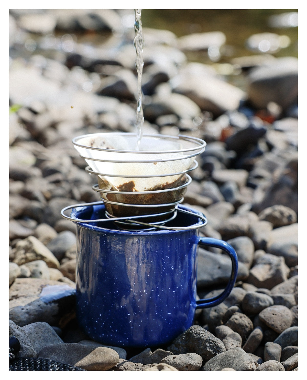 SOTO Outdoors Helix Coffee Maker being used for making camp coffee.