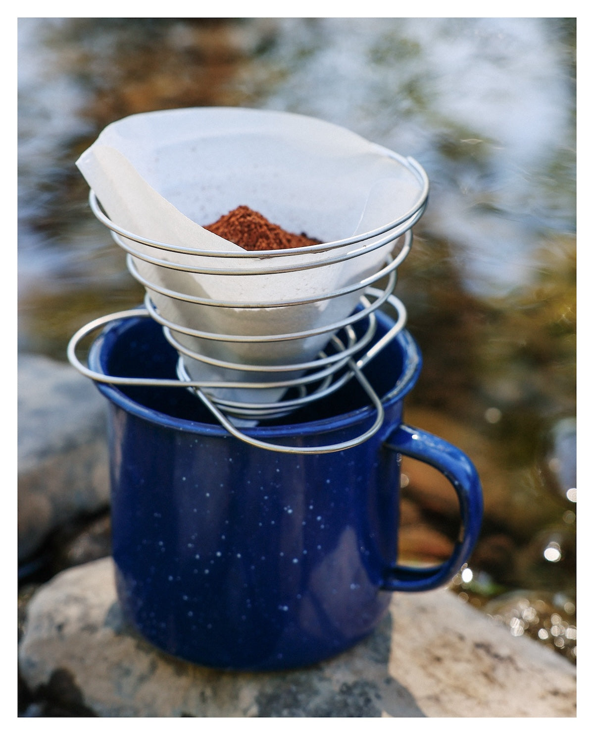 SOTO Outdoors Helix Coffee Maker being used for making camp coffee.