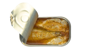 Open can of José Gourmet Sardines in Tomato Sauce on a white background