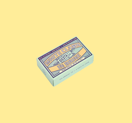 Box of Siesta Co. White Clams in Brine on a yellow background