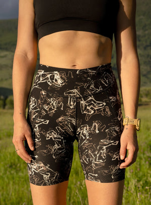 Janji's Women's 7" Pace Short in Dancing Horses being worn outdoors.