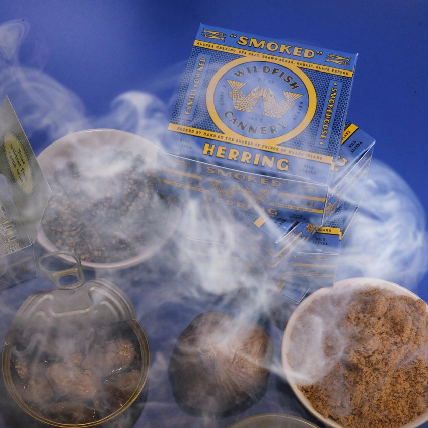 Box of Wildfish Cannery Smoked Herring on a blue background