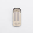 Jacobsen Salt Co. Infused Black Pepper Sea Salt Slide Tin on a white background