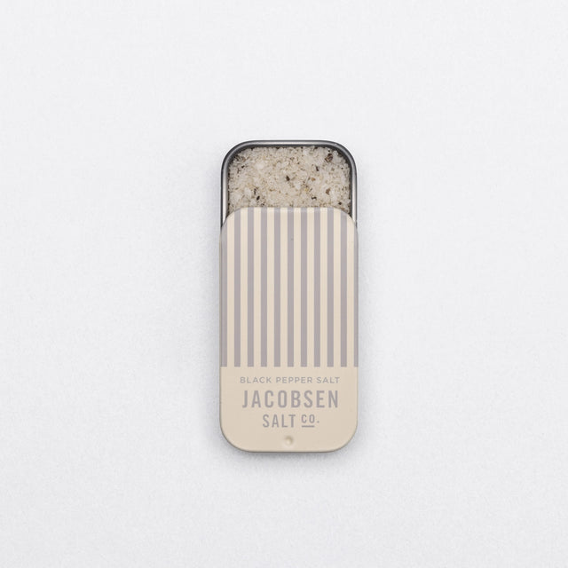 Jacobsen Salt Co. Infused Black Pepper Sea Salt Slide Tin on a white background
