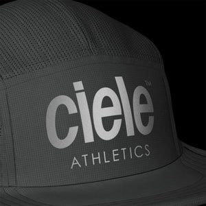 Ciele Athletics GOCap - Athletics in Ghost from the front on a dark background to show the reflective detailing.
